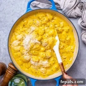 a blue skillet with pumpkin gnocchi.