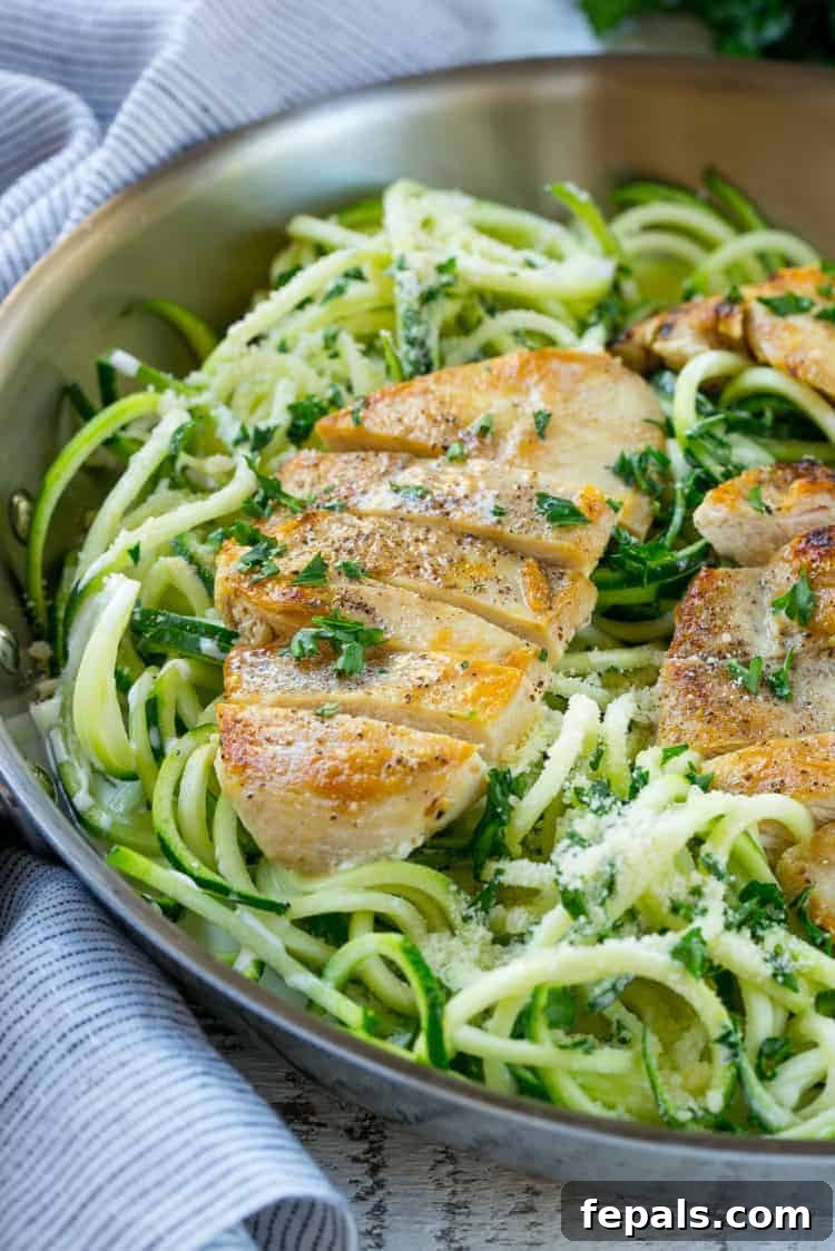 Light and Healthy Chicken Alfredo With Vegetable Noodles Perfectly cooked chicken breast served over a bed of vibrant zucchini noodles and creamy alfredo sauce.