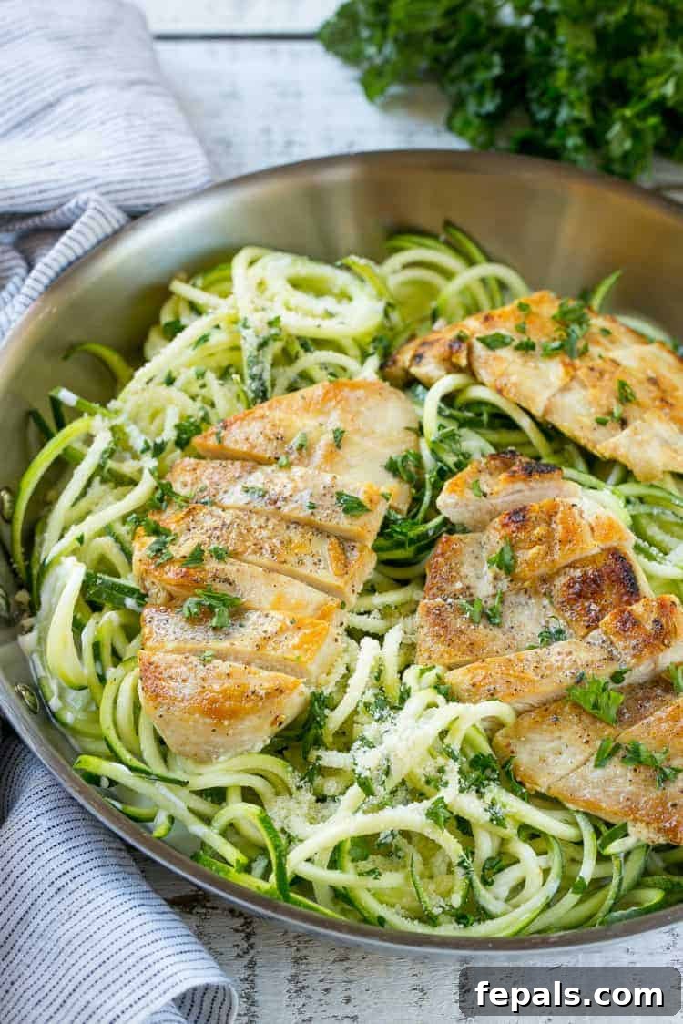 Light and Healthy Creamy Chicken Alfredo Recipe One-pan healthy and light chicken alfredo with chicken breasts, ready to be tossed with zucchini noodles.