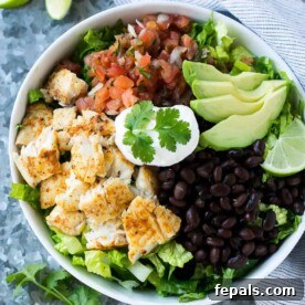 Light and Zesty Fish Taco Salad Bowls 2 top view of taco salad in bowl with fish