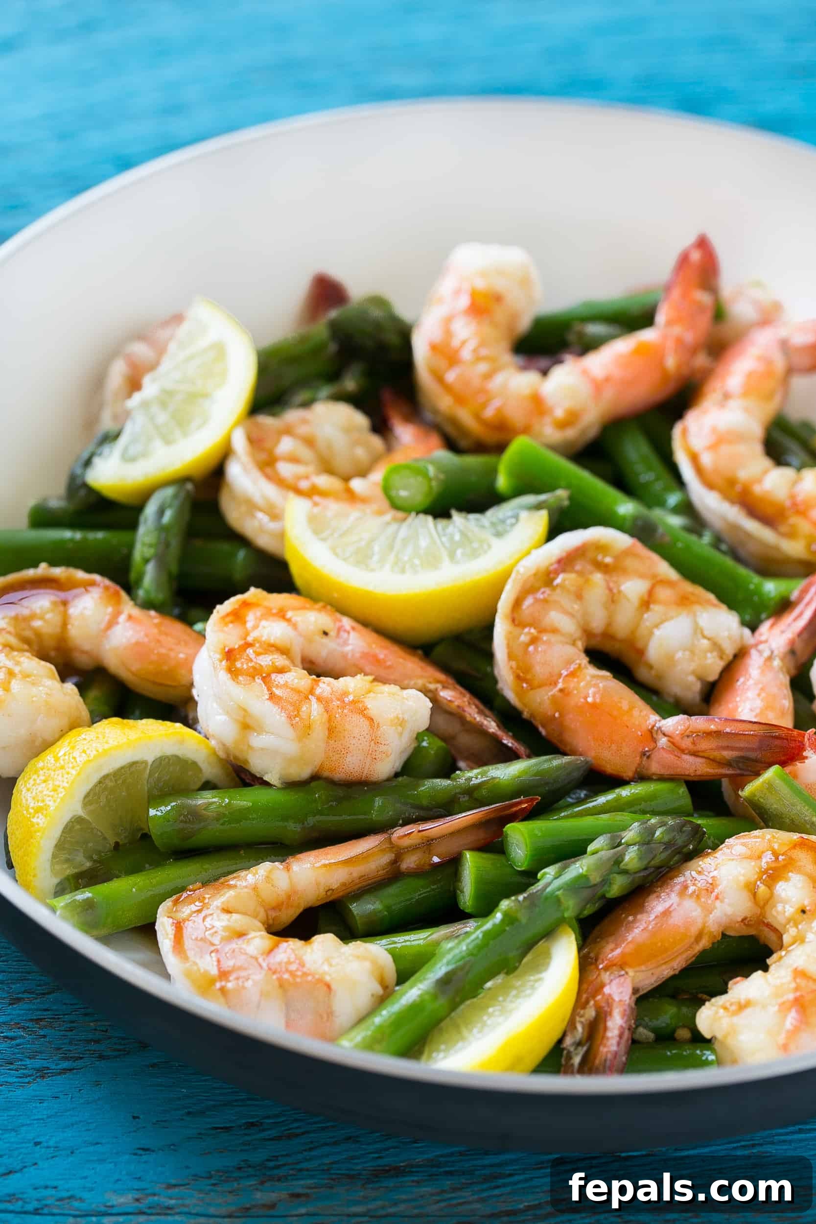 easy shrimp recipe on a plate with vibrant colors