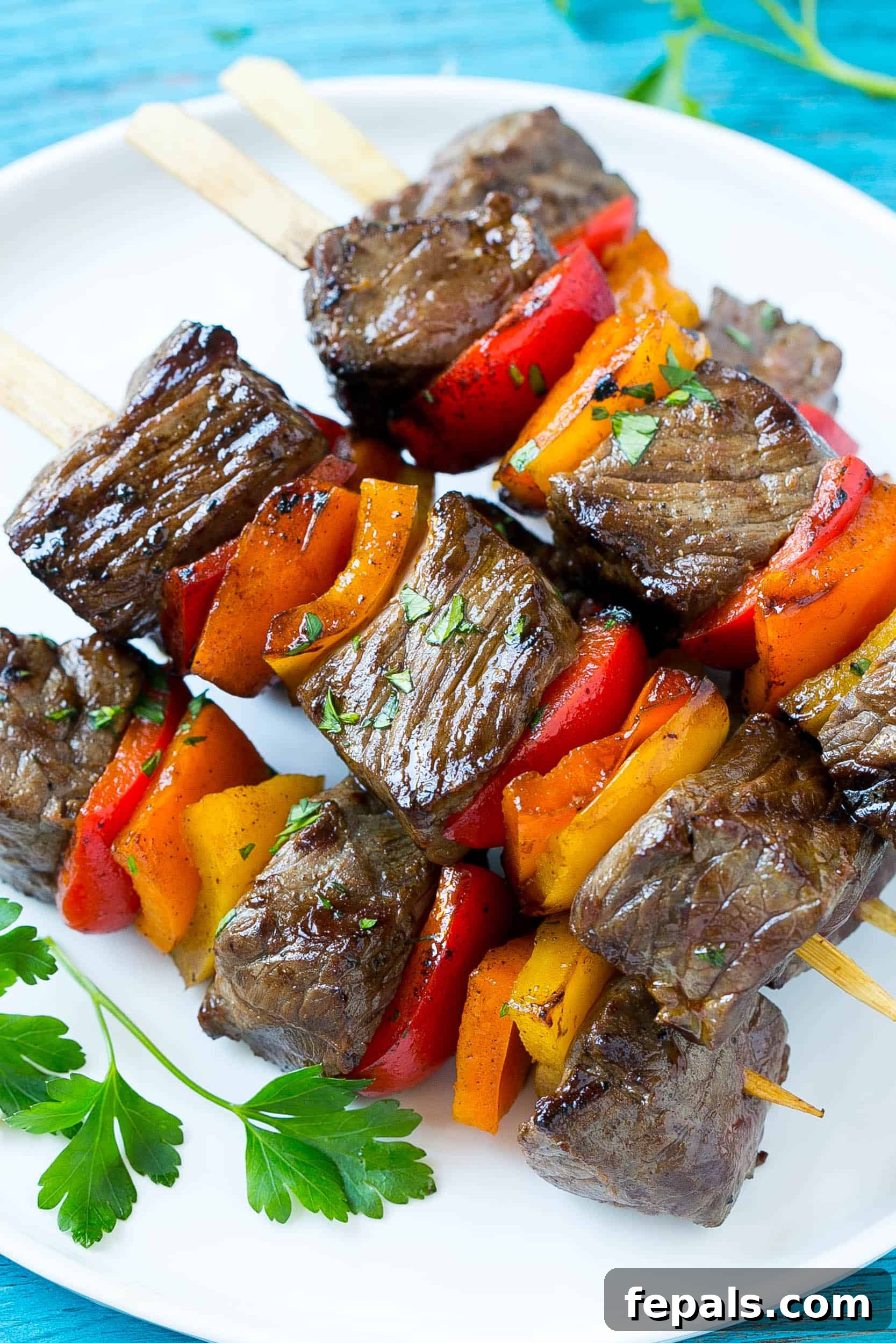 Simple and Delicious Kabob Recipe Easy to make and delicious steak and vegetable kabobs, arranged beautifully on a serving platter.