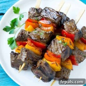Image of a cooked steak kabob with bell peppers, representing the recipe.