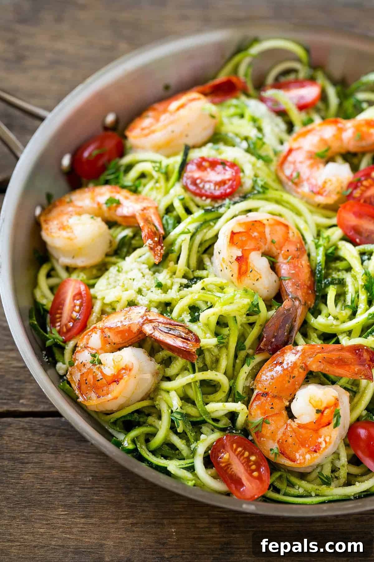 Vibrant Pesto Shrimp Zoodles 2 Pesto shrimp zoodles, a vibrant and healthy low-carb spaghetti alternative with zucchini noodles.