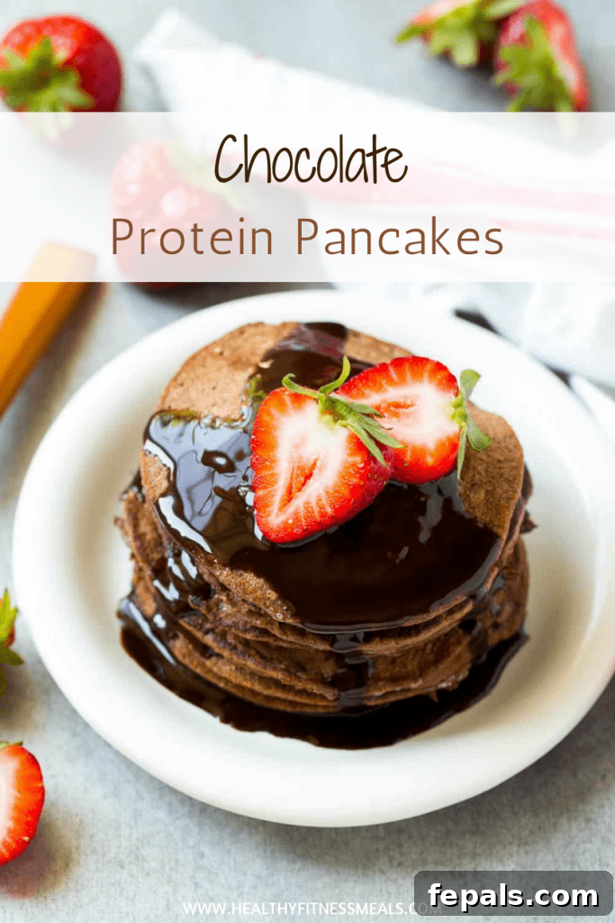 Decadent Chocolate Protein Pancakes 5 A vibrant Pinterest graphic featuring chocolate protein pancakes, enticing viewers to explore the recipe.