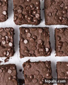 Finished protein brownie squares beautifully laid out on a flat surface, ready to be enjoyed.