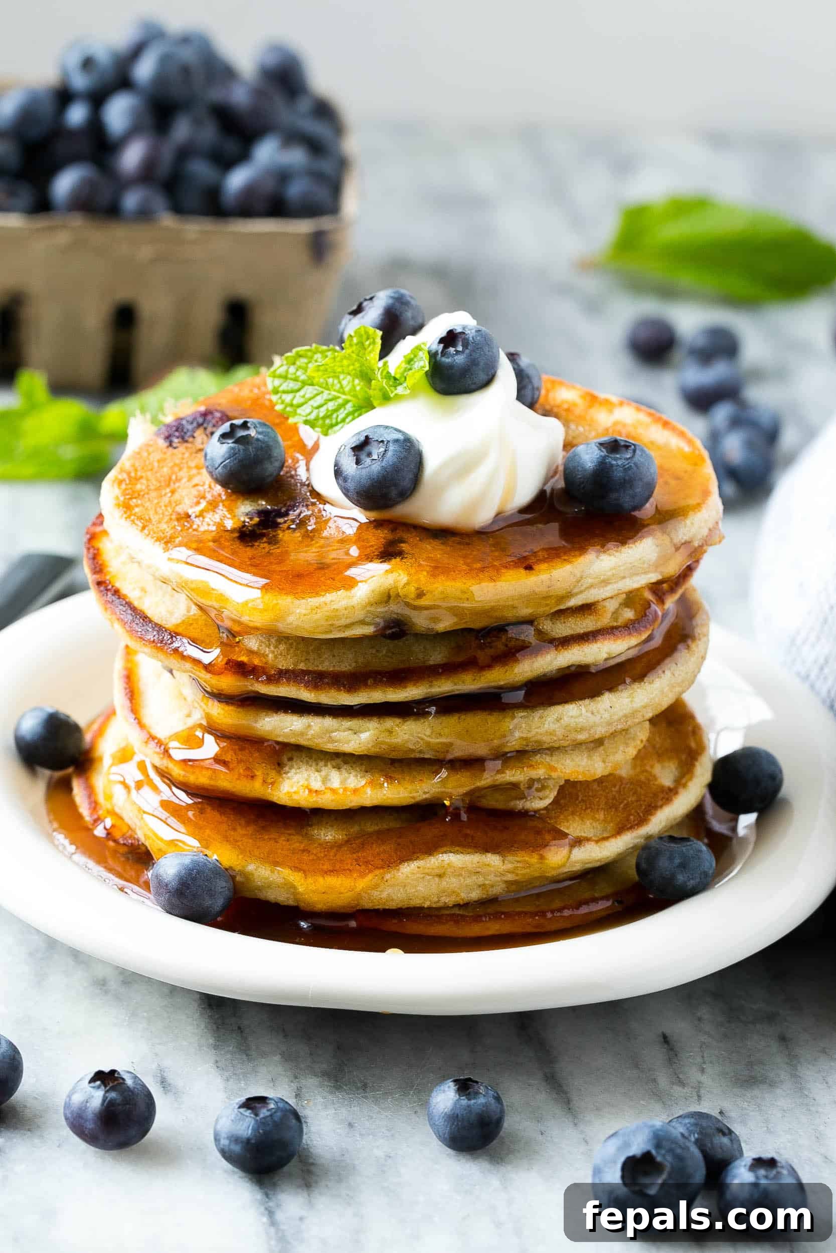 Healthy and fluffy protein pancakes with blueberries, an ideal breakfast choice