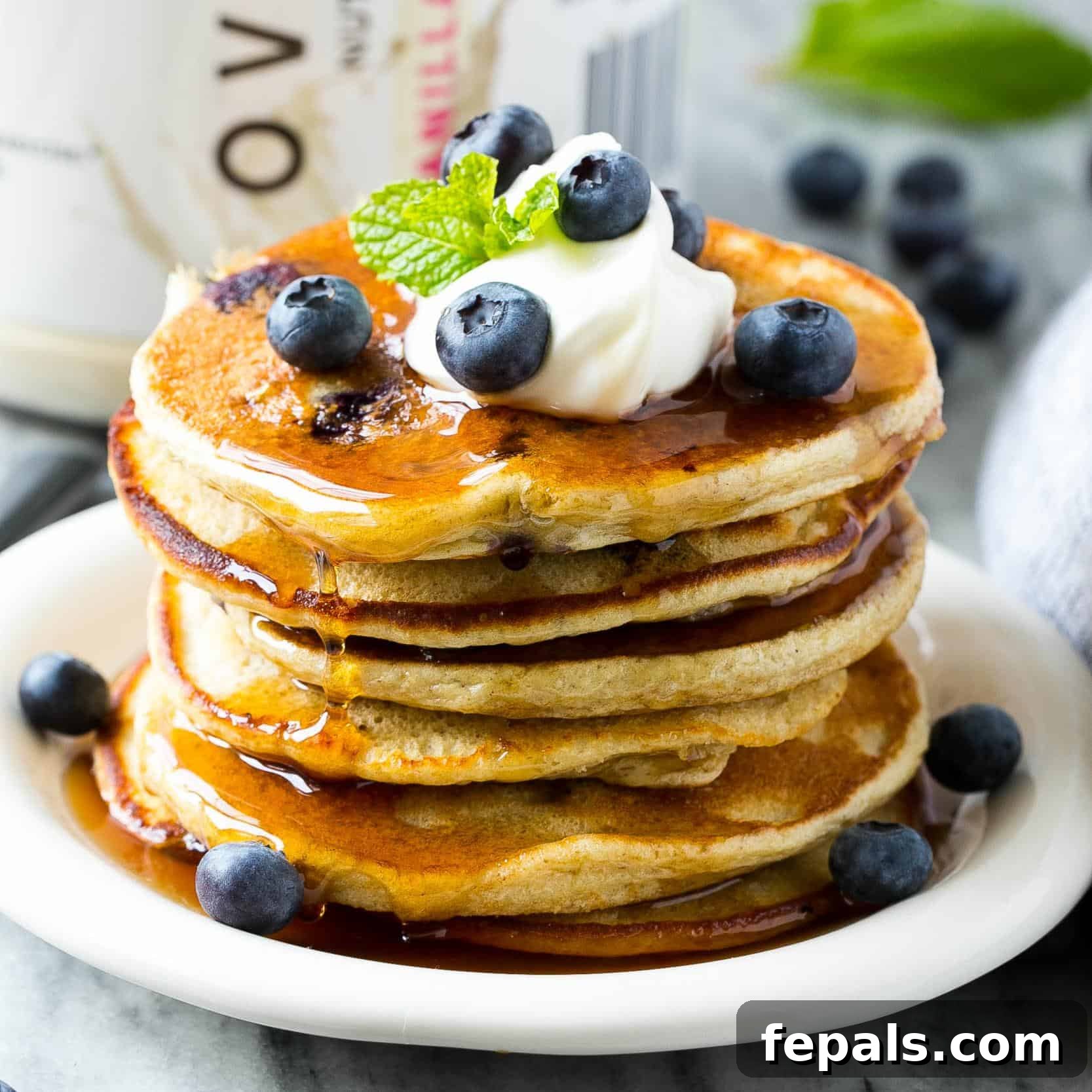 Fluffy healthy protein pancakes on a plate, ready to be served