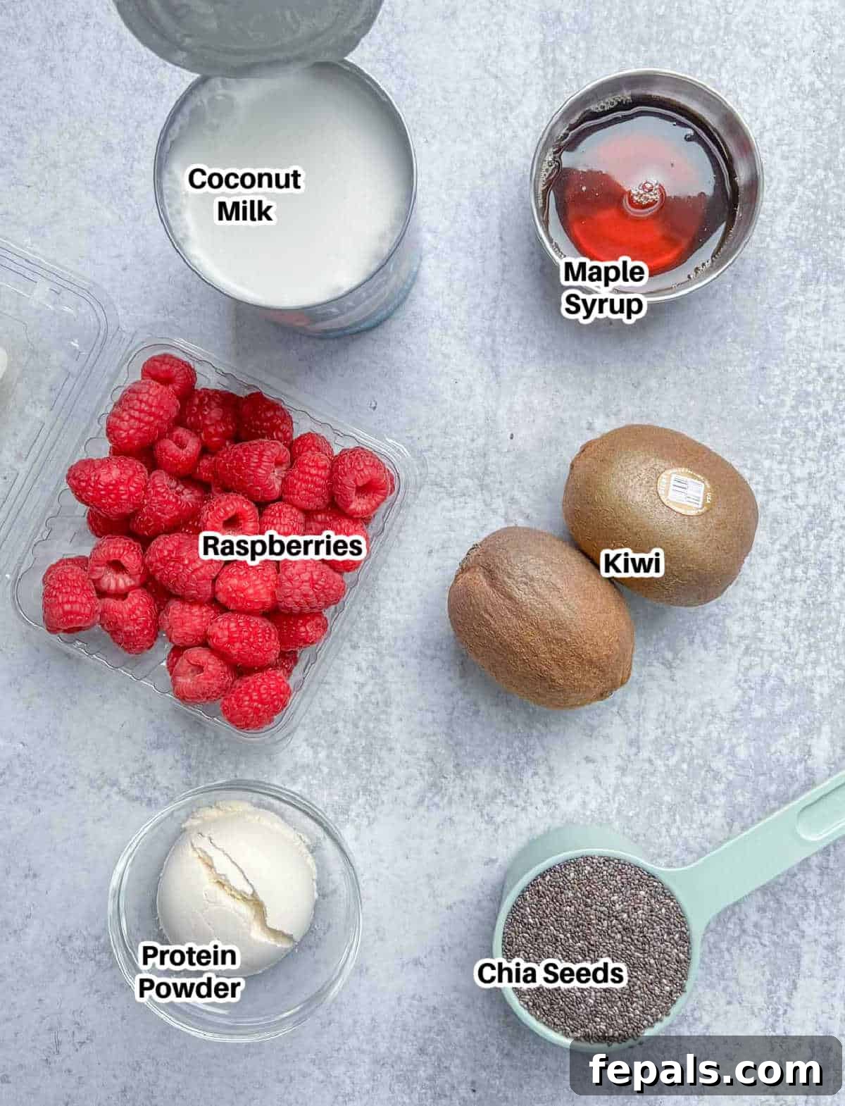 Creamy Coconut Chia Seed Pudding 2 Ingredients laid out for making Coconut Chia Pudding: coconut milk, chia seeds, maple syrup, and protein powder