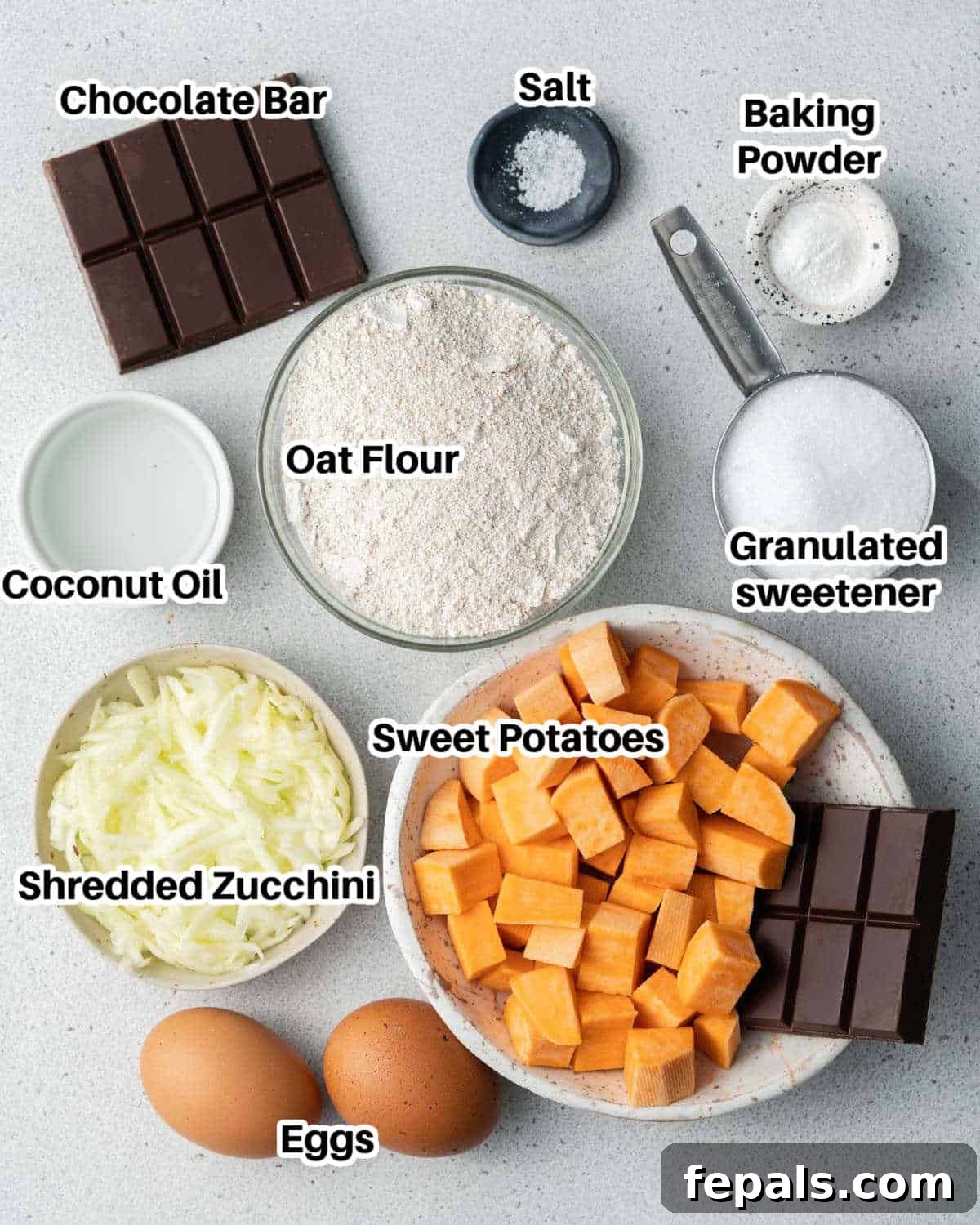 Velvety Chocolate Zucchini Indulgence 3 ingredients laid out to make chocolate zucchini cake.