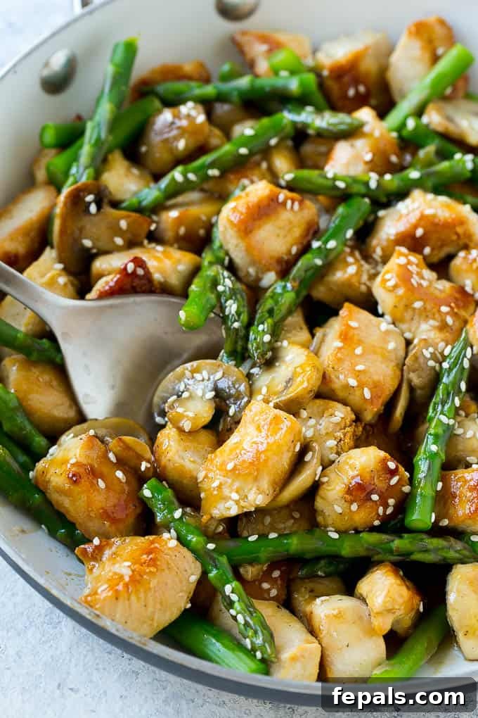 One Pan Chicken Asparagus Dinner 2 Delicious Chicken Mushroom and Asparagus Stir Fry, perfect for a quick and healthy meal.