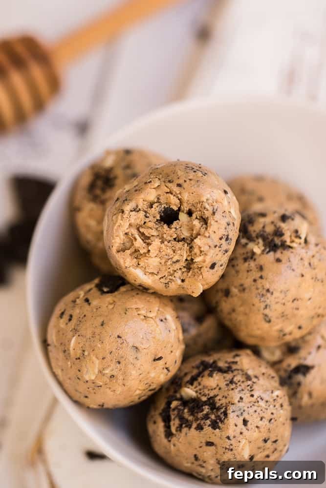 Cookies and Cream Energy Bites arranged artfully on a plate, showcasing their inviting texture