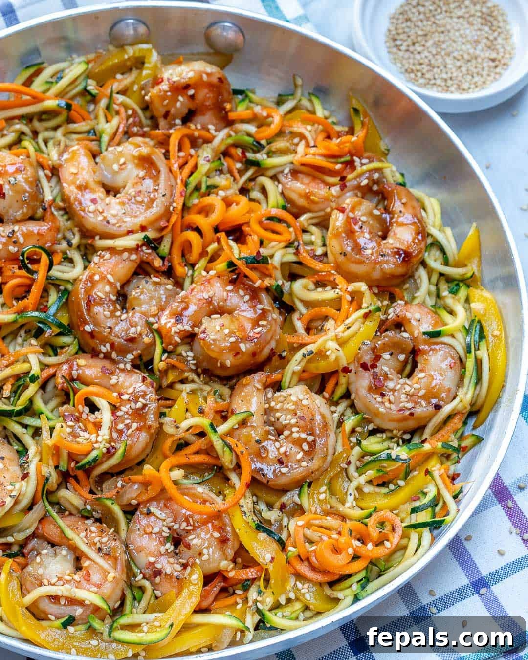 Vibrant Asian Shrimp Zoodle Stir-fry 5 Close-up of the finished shrimp zoodles with sesame seeds