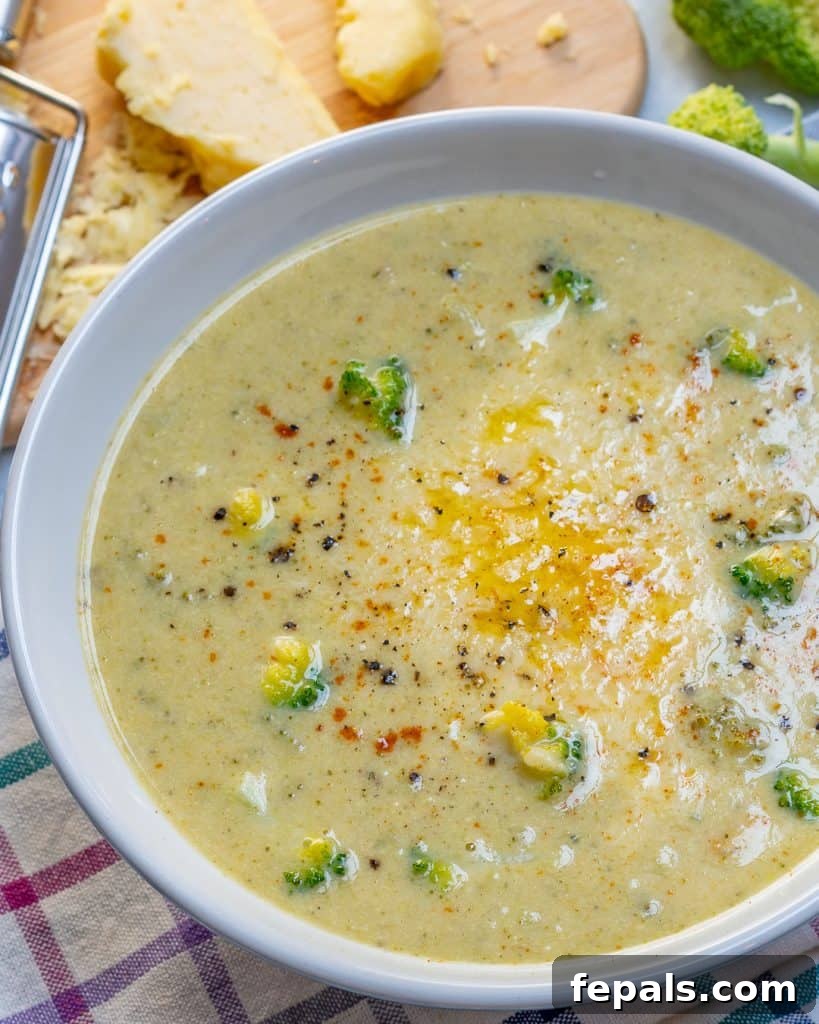 Wholesome Broccoli Cheddar Bliss 8 close up of Broccoli Cheddar Soup in a round white bowl