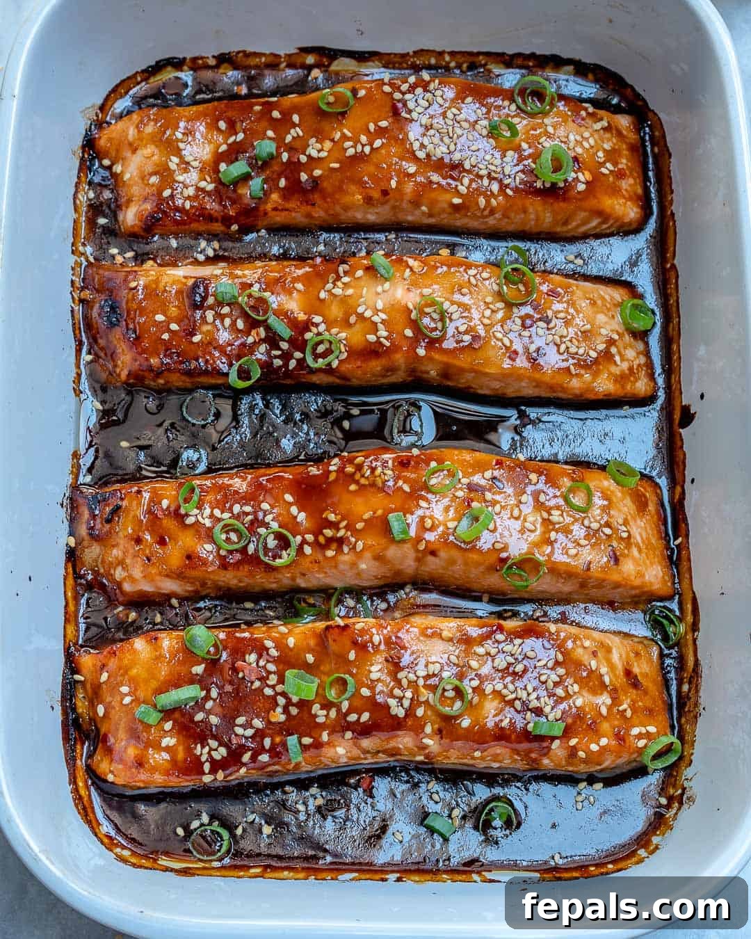 Sticky Teriyaki Salmon Bake 2 Healthy Baked Teriyaki Salmon garnished with green onions and sesame seeds