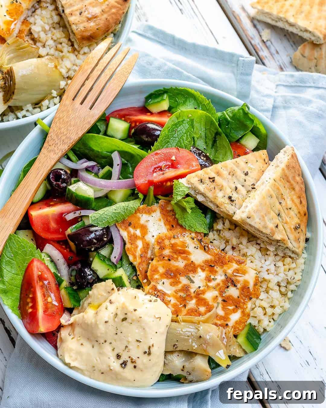 Greek Meze Feast Bowl 2 Vibrant Greek Meze Power Bowls ready to be enjoyed
