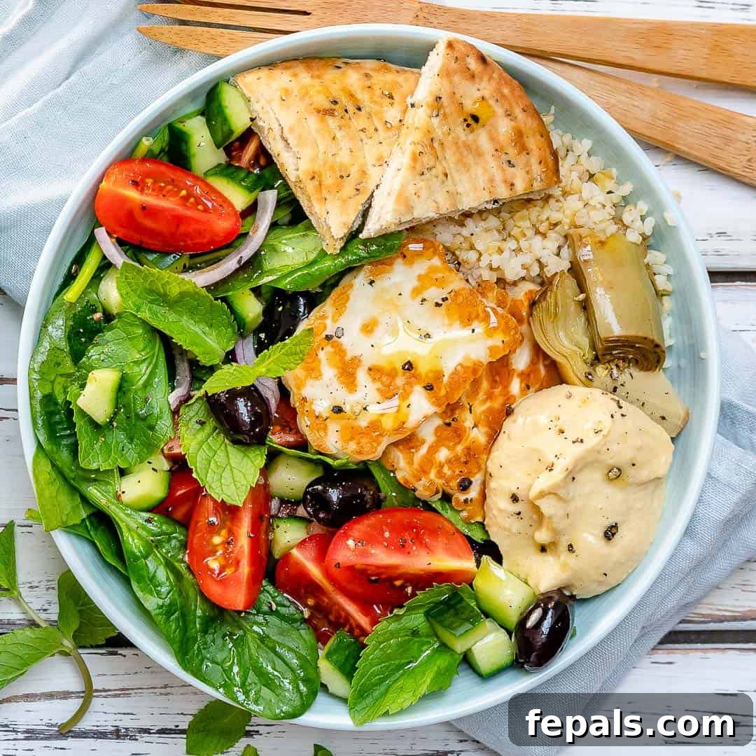 Greek Meze Feast Bowl 4 A colorful spread of Greek Mezze bowl components