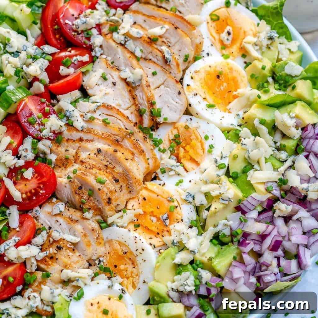 close up view of chicken cobb salad in a dish