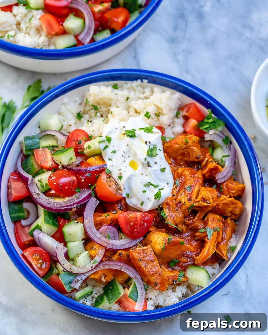 Spiced Moroccan Chicken Couscous Bowl 2 A vibrant Moroccan chicken couscous bowl, packed with chicken, couscous, and fresh vegetables.