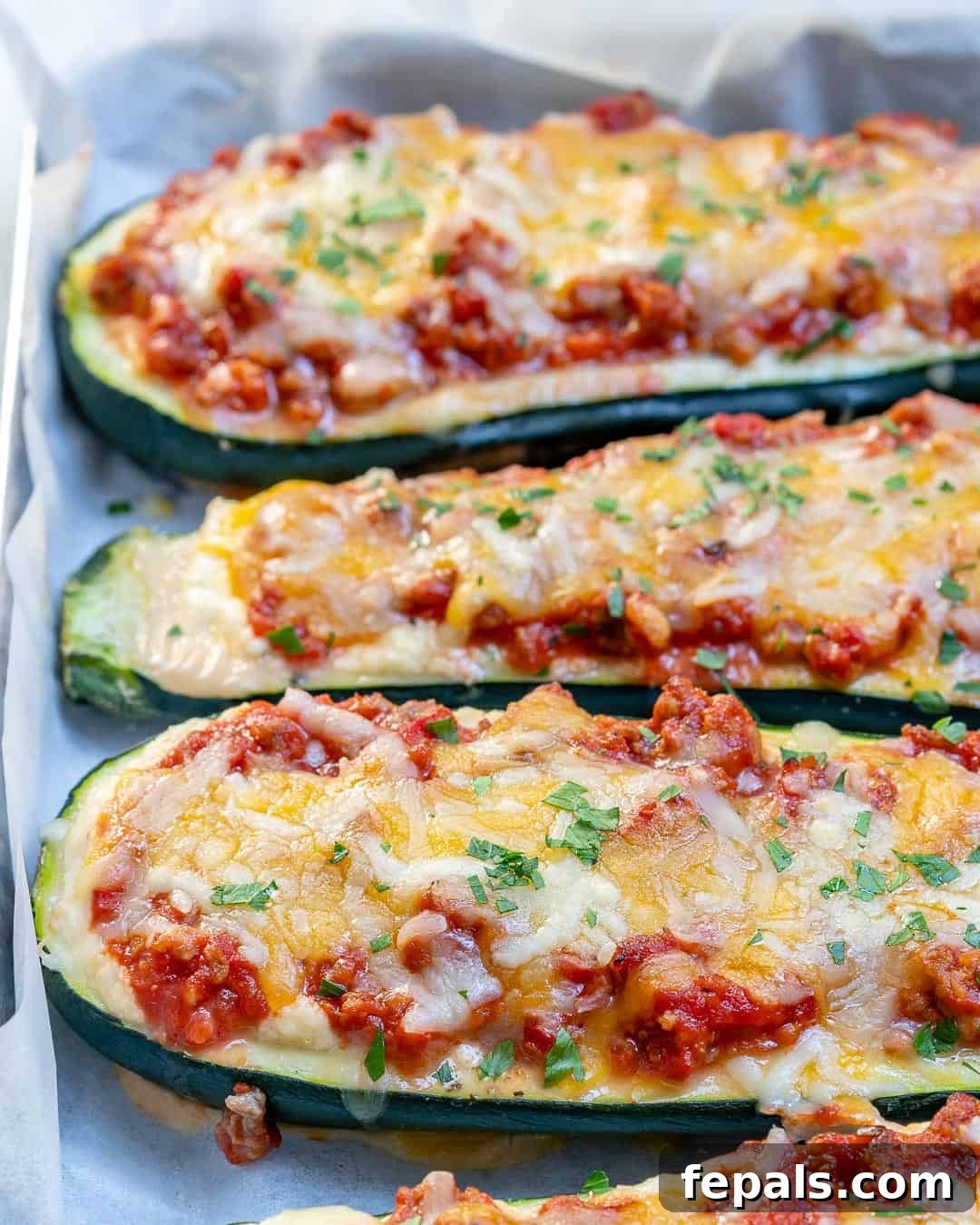 Delicious zucchini lasagna boats with ground turkey and rich marinara sauce