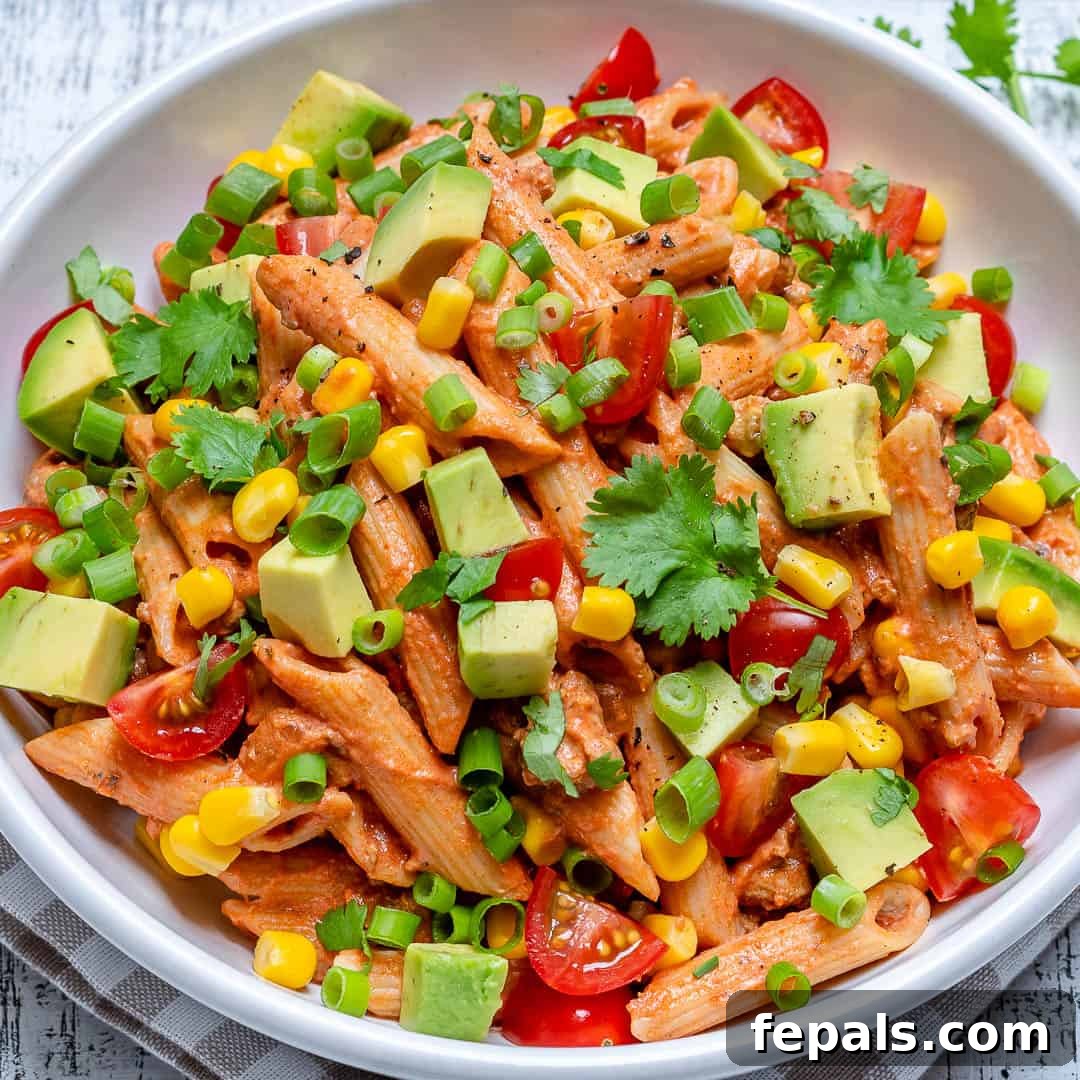 Fiesta Taco Pasta Salad 6 The best taco pasta salad presented in a clean white bowl, ready to be enjoyed.