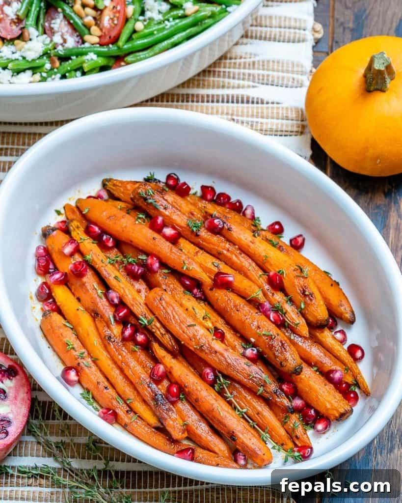 roasted carrots as a side dish on a table with other veggie dish