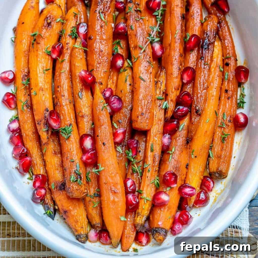 top view of roasted carrots on a white dish