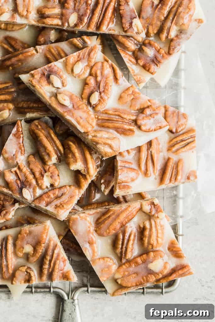square bars of keto pecan brittle on a wire wrack