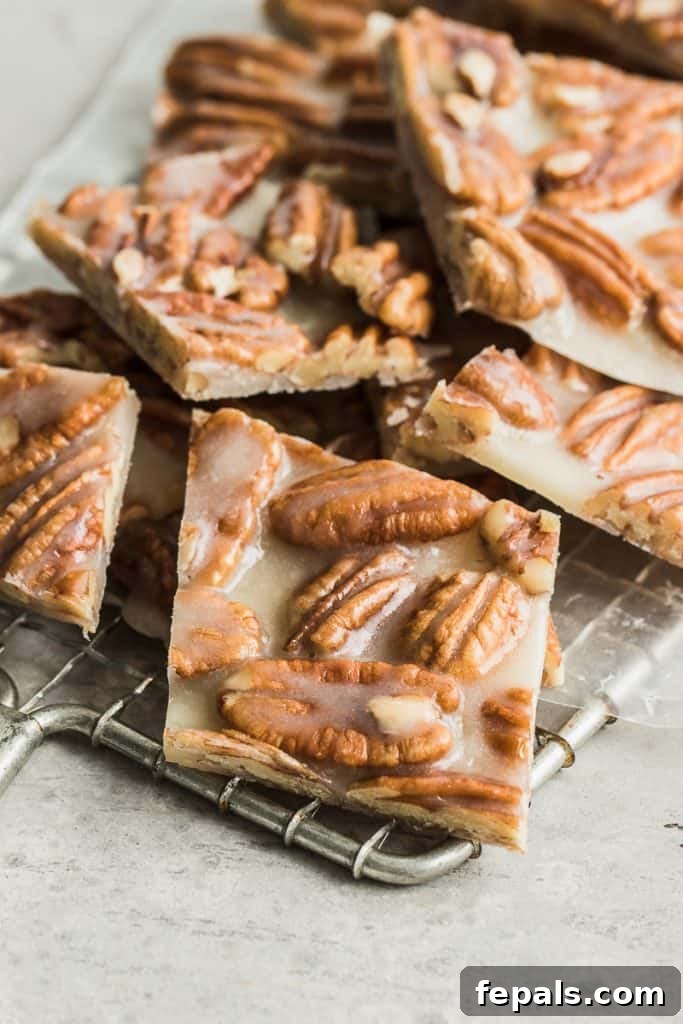 close up of pecan brittle bars on a wrack to cool