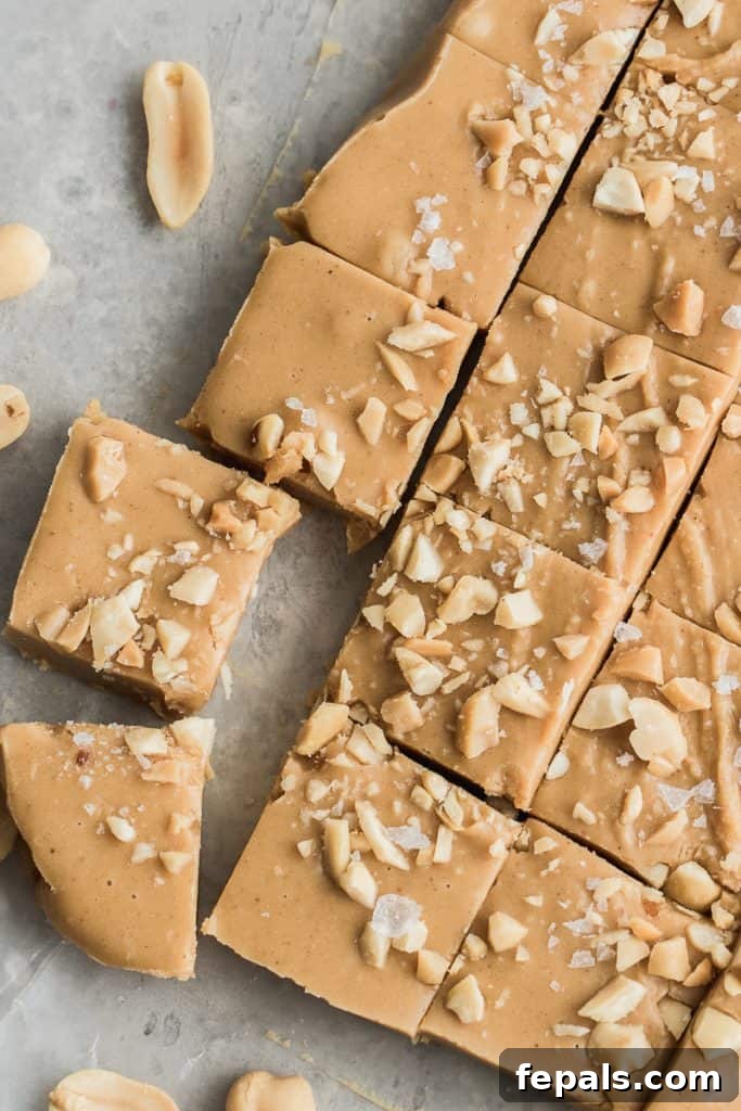 Decadent Peanut Butter Fudge 2 Top view of delicious homemade peanut butter fudge squares cut and arranged on a counter.