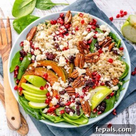 top view of quinoa salad in a white bowl