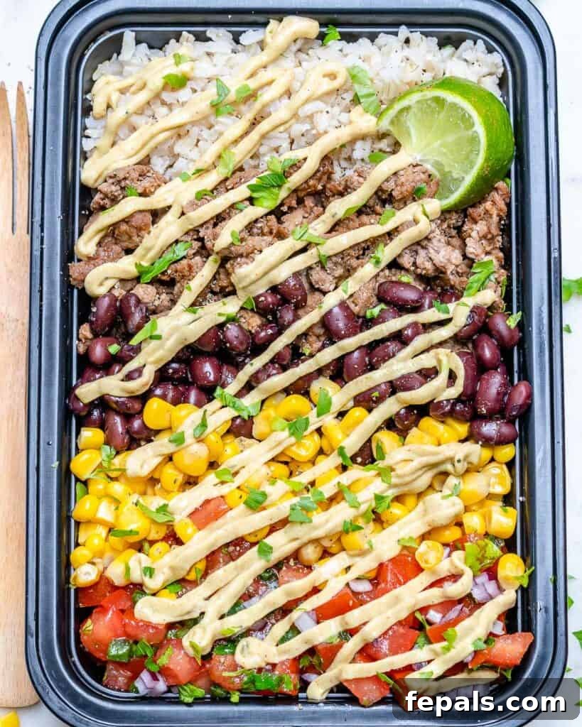 Beef Burrito Power Bowls 6 top view or meal prep bowl with beef burrito and rice