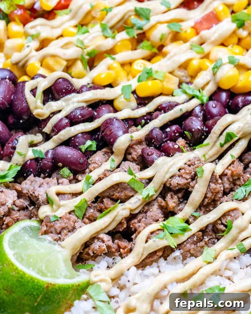 Beef Burrito Power Bowls 7 close up view of burrito bowl with ground beef, rice, beans, and corn