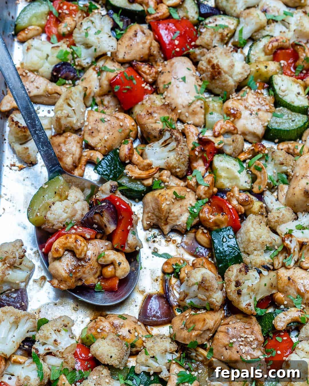 Sheet pan cashew chicken with colorful vegetables