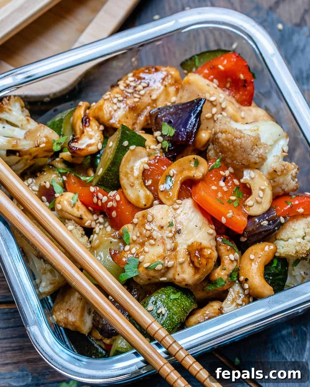 Healthy homemade Chinese cashew chicken with sauce