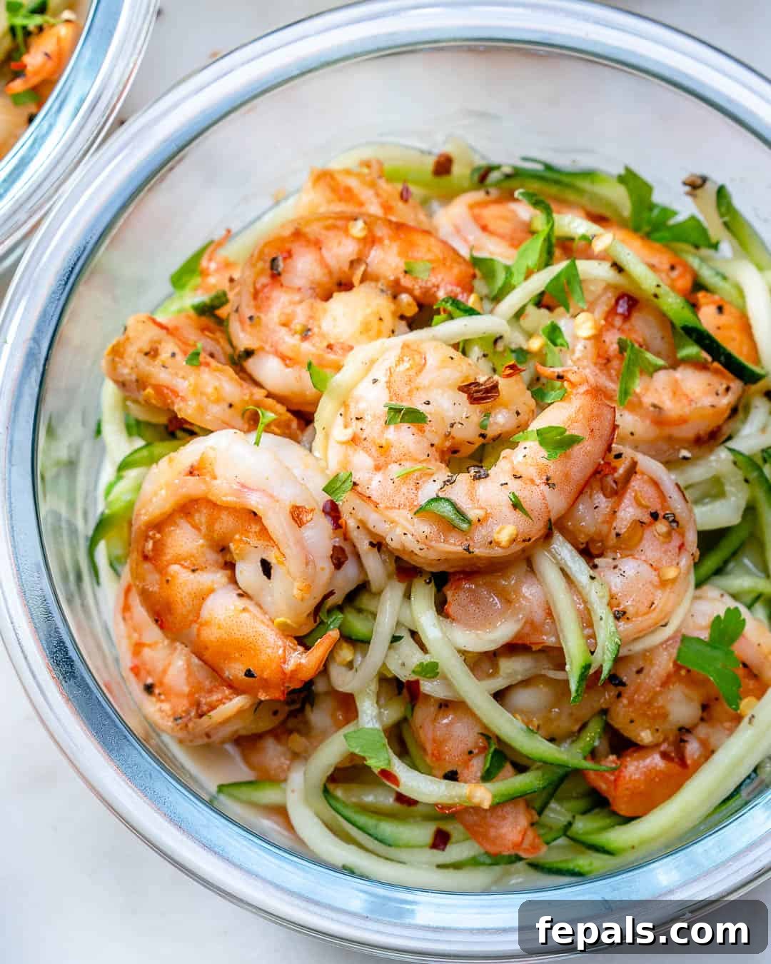 Flavor Burst Shrimp 2 sauteed bang bang shrimp over zoodles in a bowl.