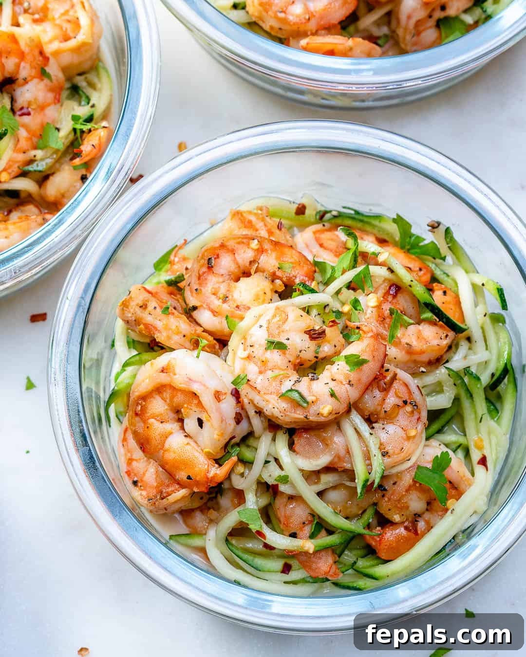 Flavor Burst Shrimp 5 2 bowls of sauteed shrimp over zoodles.