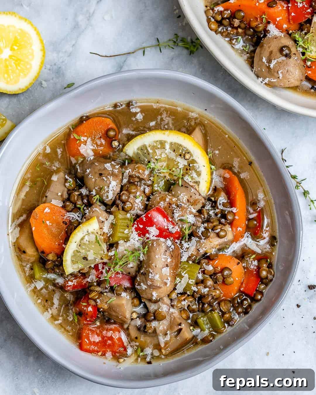 top view of a bowl with lentil and mushroom soup