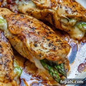 stuffed chicken breast on a skillet.