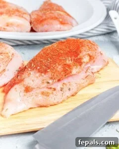 Chicken breast sliced in the middle to be stuffed.