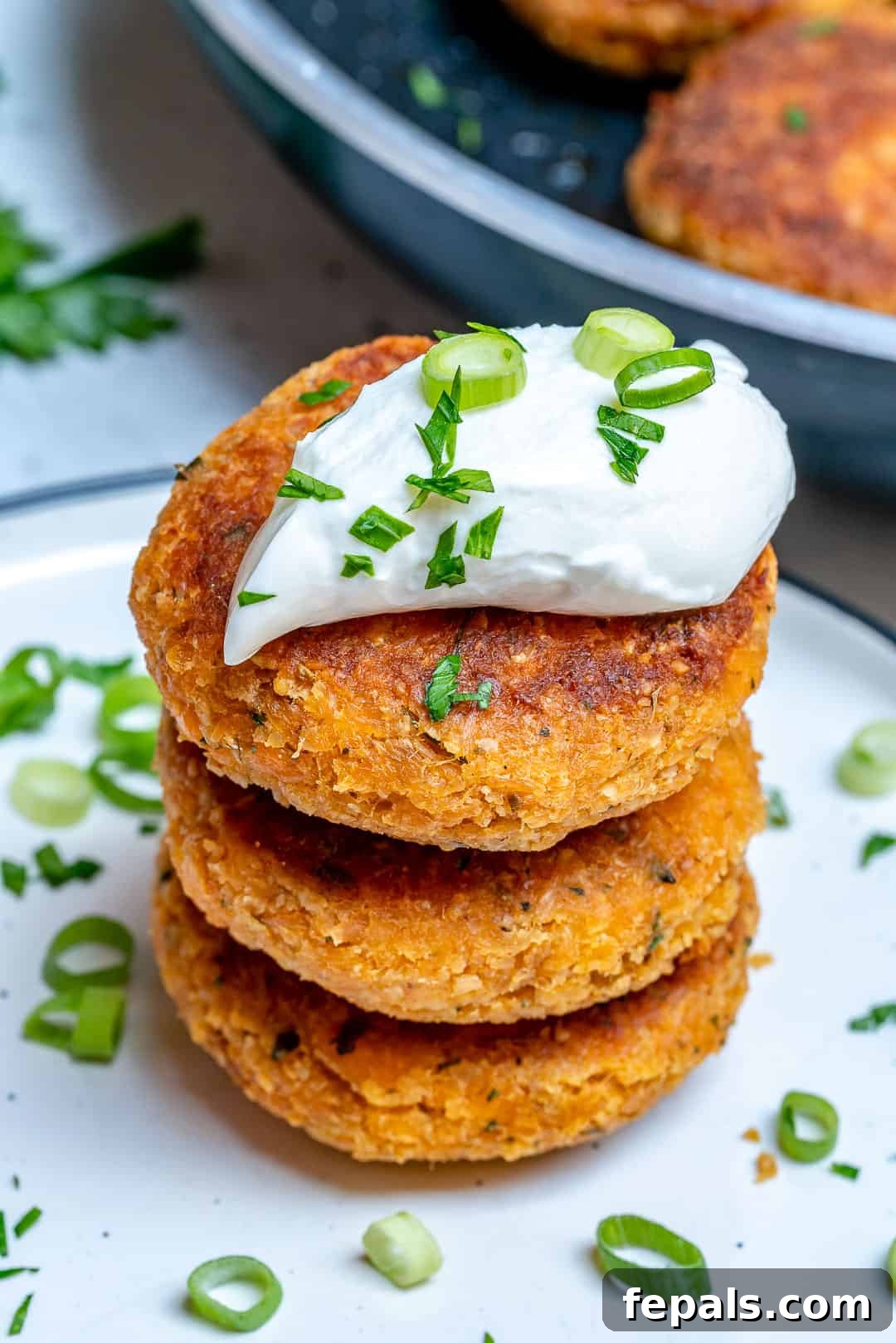 salmon cakes stacked on each other 