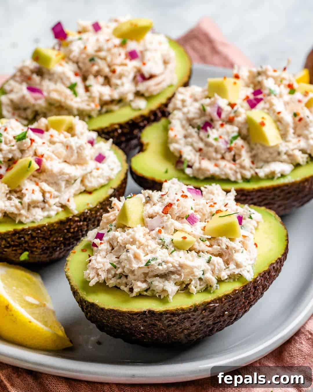 Wholesome Chicken Salad Avocado Boats 5 How to make chicken salad, showing the fresh ingredients ready for mixing.