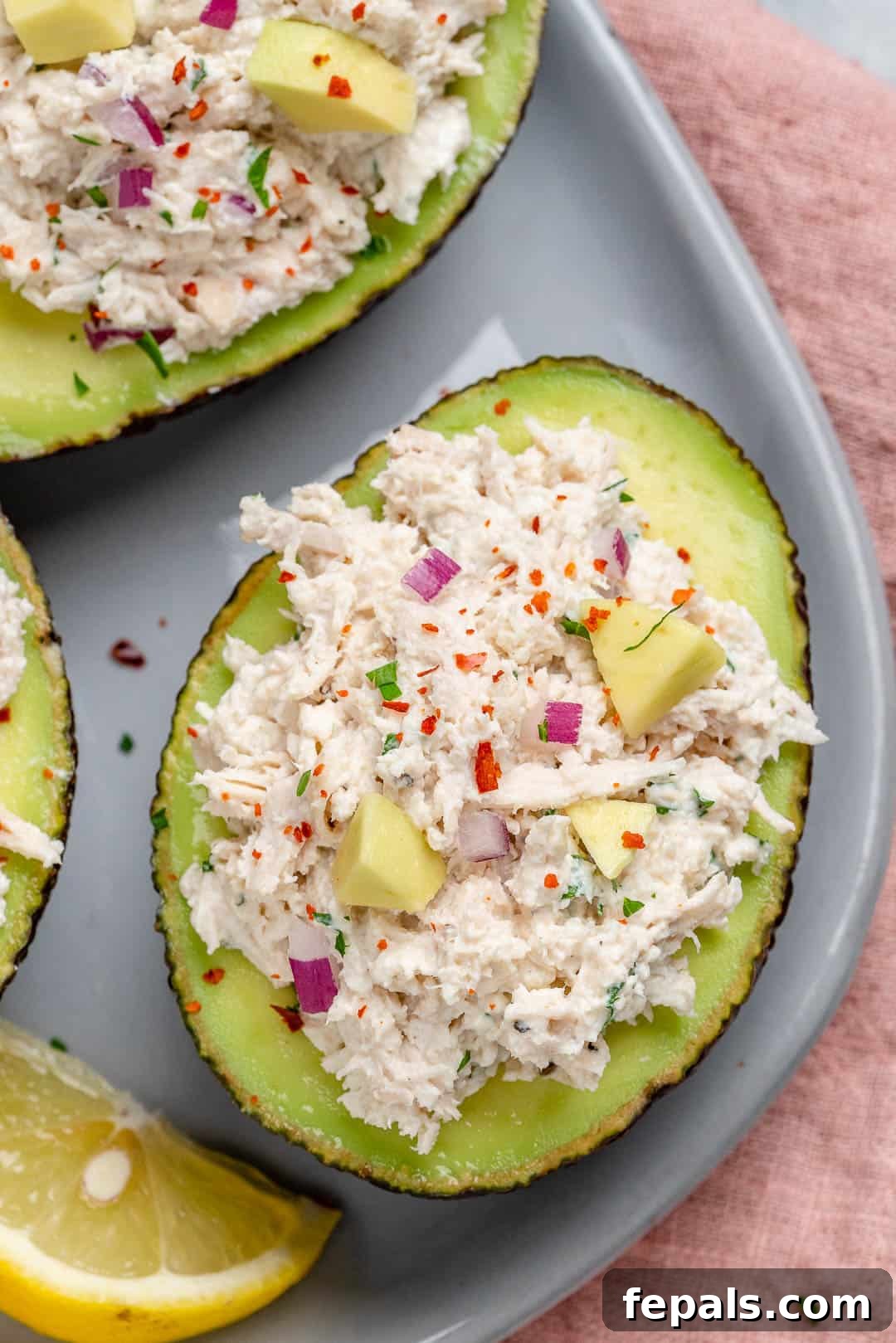 Wholesome Chicken Salad Avocado Boats 10 Close-up of stuffed avocado, highlighting the fresh texture.