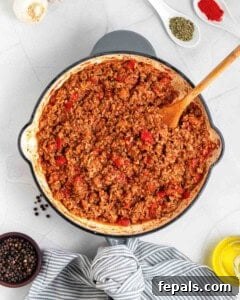 beef and rice stuffing cooked in a pan.