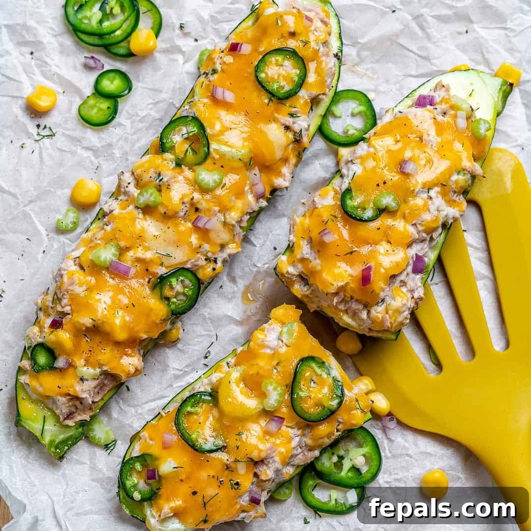Cheesy Tuna Melt Zucchini Boats 5 Delicious and healthy tuna melt zucchini boats, perfect for a light meal.
