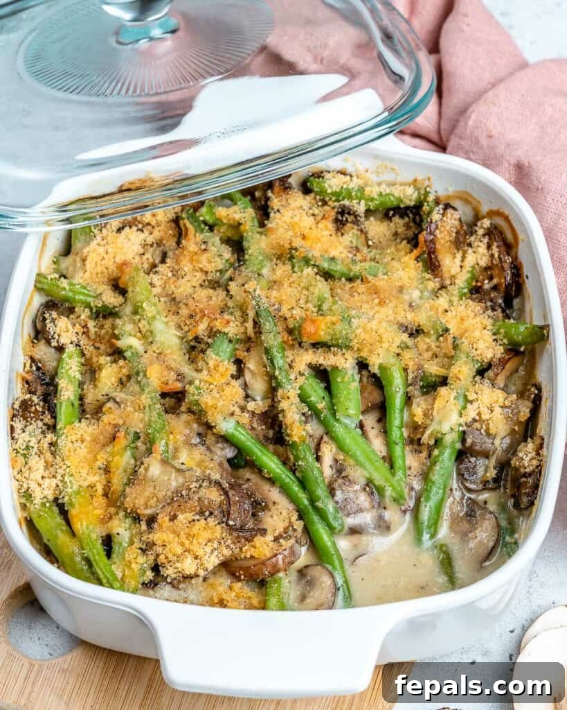 Wholesome Green Bean Delight 8 Easy green bean casserole recipe, freshly baked in a white dish.