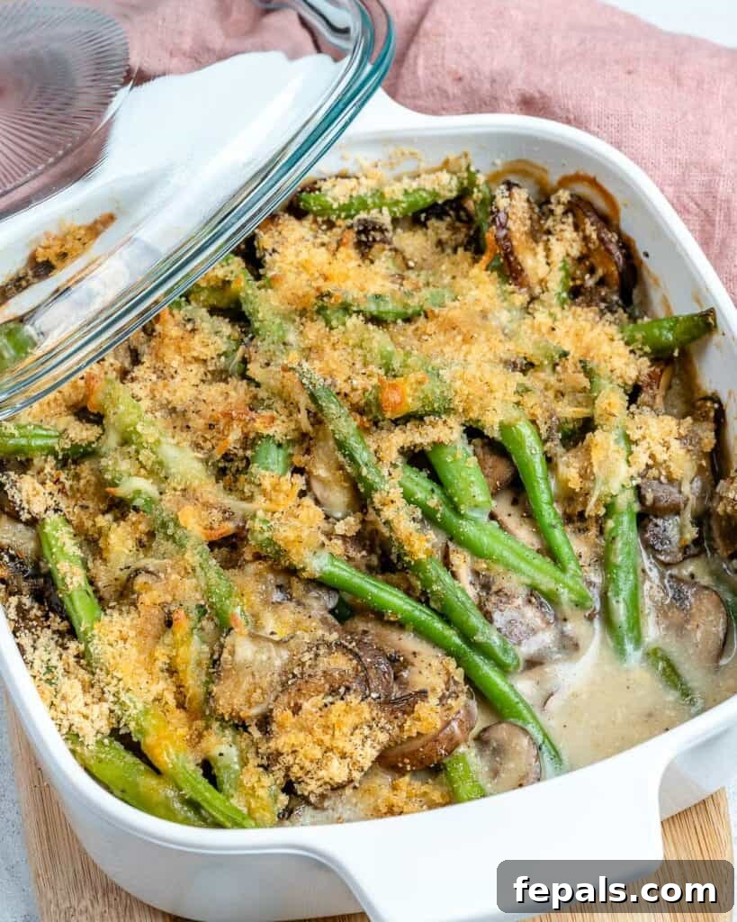 Wholesome Green Bean Delight 10 An easy green bean casserole recipe served in a white baking dish.