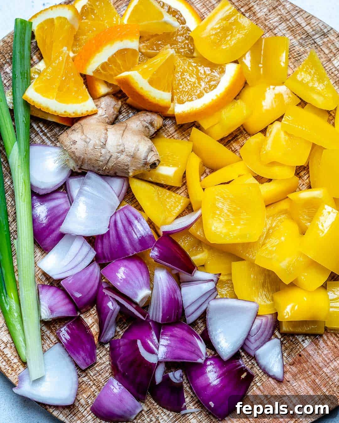 Colorful veggies and chicken stir fry cooking together