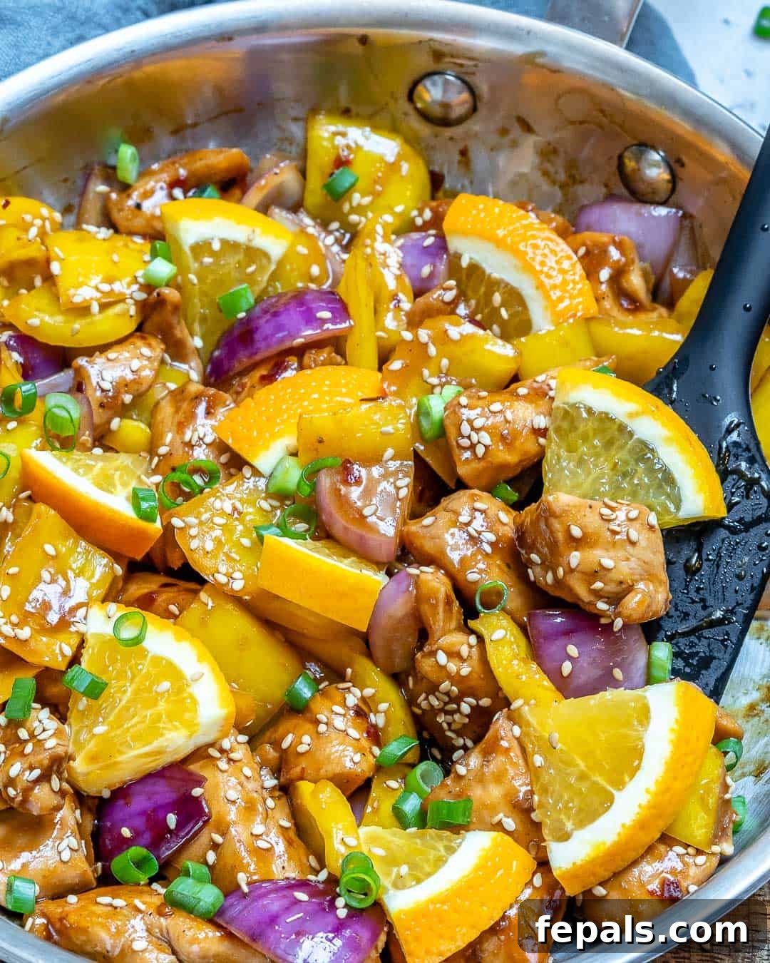 A serving of homemade orange chicken on a plate