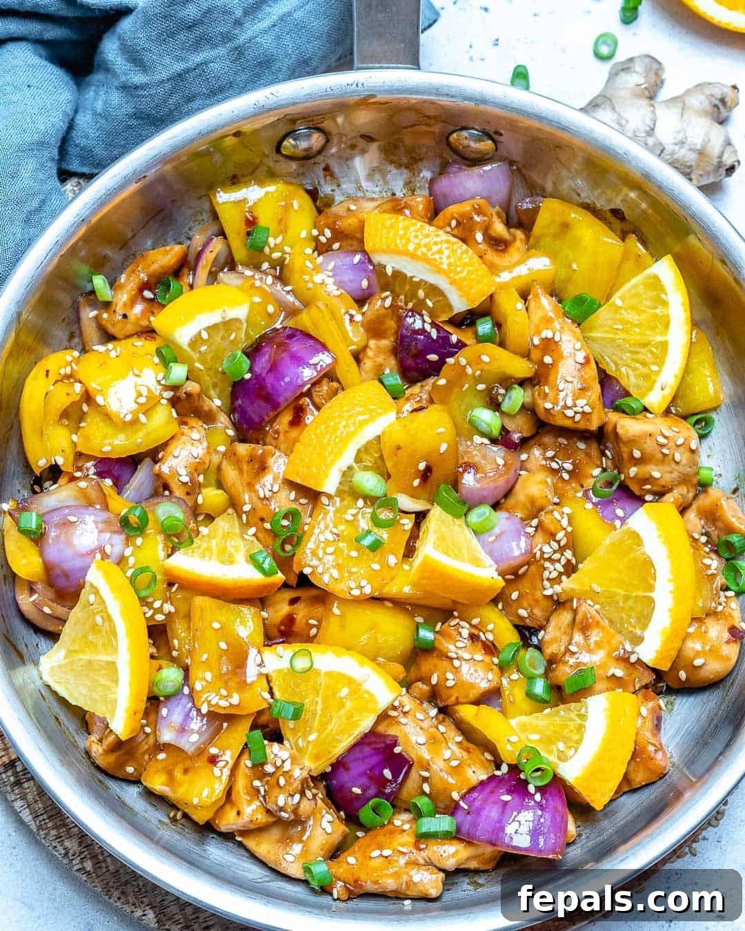 Best orange chicken recipe presented on a cutting board